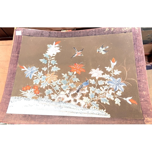 619 - A pair of Japanese prints, framed, a set of nine hand-painted decorative panels, 32x43cm.