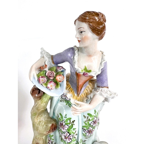 443 - A pair of Sitzendorf porcelain figures of a shepherd and shepherdess in 18th Century dress; an UNTER... 