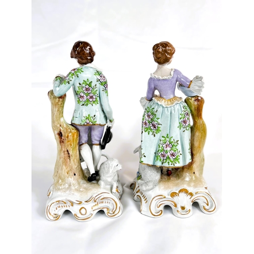 443 - A pair of Sitzendorf porcelain figures of a shepherd and shepherdess in 18th Century dress; an UNTER... 