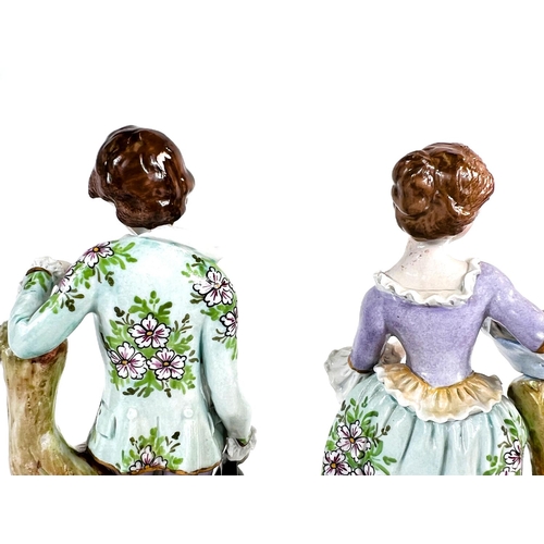 443 - A pair of Sitzendorf porcelain figures of a shepherd and shepherdess in 18th Century dress; an UNTER... 