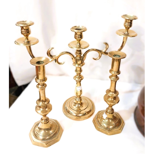 128 - A pair of Victorian brass candlesticks, brass candelabra, copper one gallon flagon.