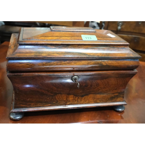 61 - A Georgian Rosewood sarcophagus tea caddy, waisted body, stepped lid, interior glass bowl.