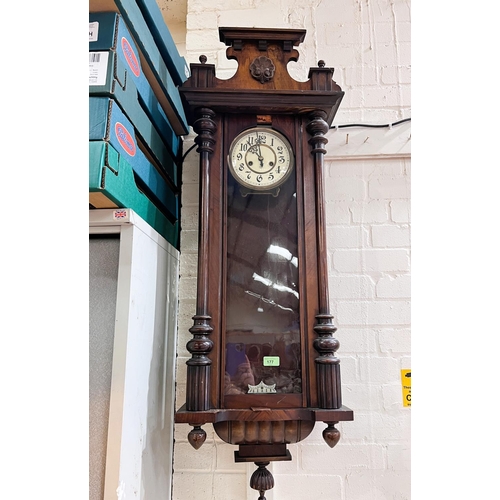 62 - A mahogany cased Vienna wall clock, spring driven.