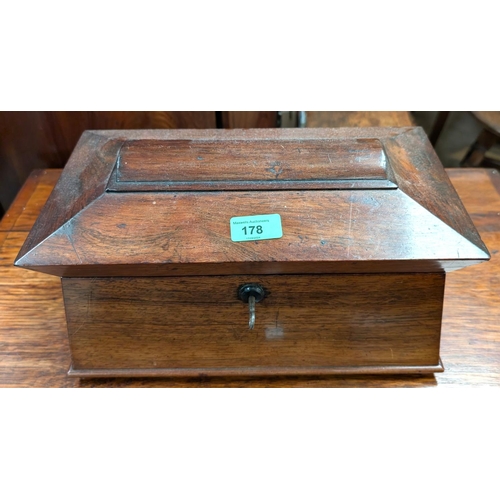 63 - A 19th Century rosewood tea caddy/converted sewing box, coffin shaped, and a small single drawer che... 