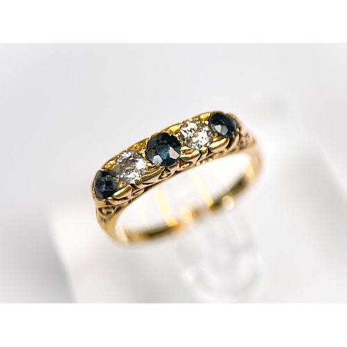 763 - An 18 carat hallmarked gold ring with 3 sapphires and 2 sapphires set alternately, size N/O, 4gm