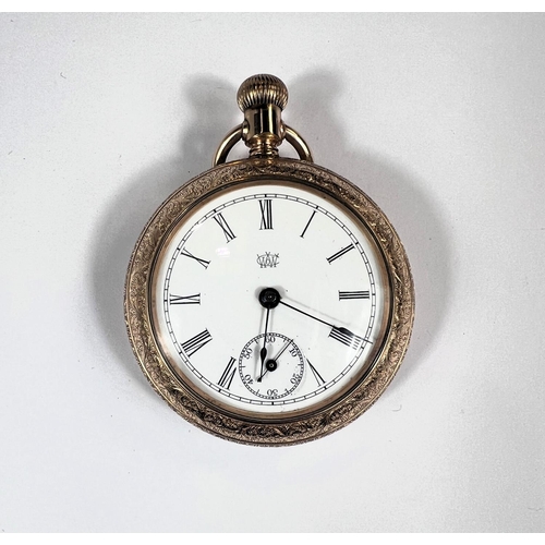 764 - A WATERBURY Duplex gilt cased pocket watch with ornate engraving, early 20th Century.