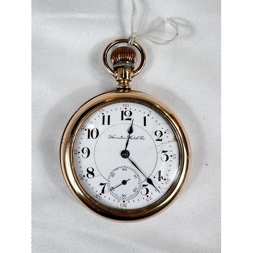 762 - HAMILTON WATCH CO. a pocket watch in gold filled case with 21 jewel swing out movement, no. 380301. ... 