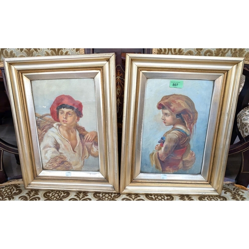 826 - A pair of 19th Century oil on canvas half portraits of girl and boy in peasants clothing, gilt frame... 