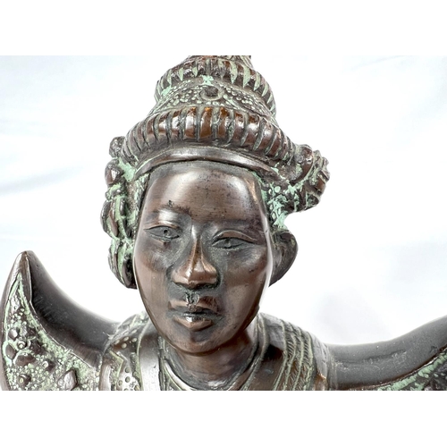 176 - A Burmese bronze bust in traditional dress height 13cm 