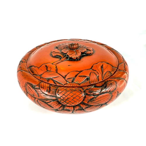 643 - A large 19th Century Chinese cinnabar lacquer covered bowl with leaves in relief, bearing Sainsbury'... 