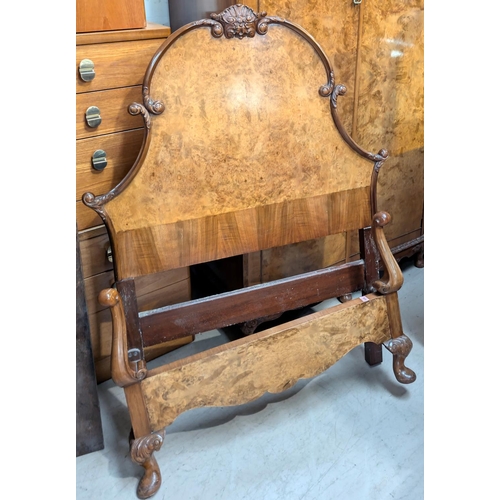 1035 - A burr walnut part bedroom suite featuring a pair of Epstein style single beds foot and irons and a ... 