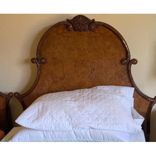 1035 - A burr walnut part bedroom suite featuring a pair of Epstein style single beds foot and irons and a ... 