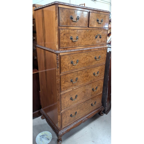 1038 - A tall and impressive set of Burr walnut Epstein style dressing chest with two short and six long dr... 