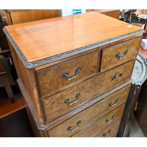 1038 - A tall and impressive set of Burr walnut Epstein style dressing chest with two short and six long dr... 