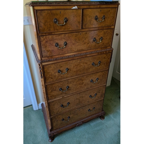 1038 - A tall and impressive set of Burr walnut Epstein style dressing chest with two short and six long dr... 