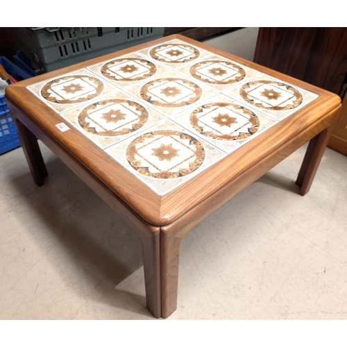 934 - A mid 20th century teak, tile top, square table.