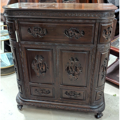 1001 - A 1920's Chinese carved cocktail cabinet with carved parrots, rounded form, pop up secret compartmen... 