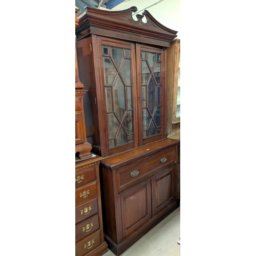 1007 - A Victorian large and impressive mahogany full height bookcase with bevelled glass top with astragal... 