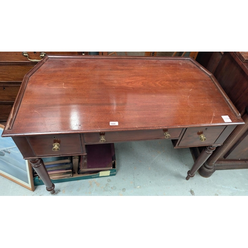 1020 - A 19th century mahogany side table with three drawers below, brass fittings , canted back, length 11... 