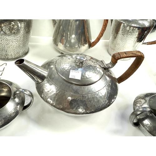 104 - LIBERTY'S TUDRIC pewter a 4 piece tea service, pattern no 01537, a similar offee pot 0993 and a bisc... 