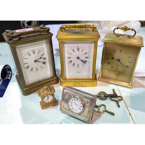 139 - A Jack chiming carriage clock, and another, and a Kitney and Company white metal clock and two other... 