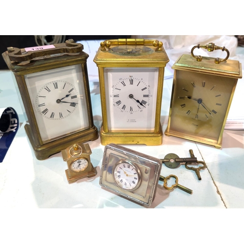 139 - A Jack chiming carriage clock, and another, and a Kitney and Company white metal clock and two other... 