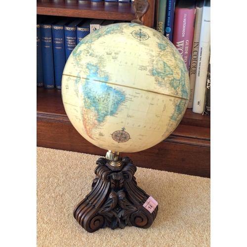 14 - A reproduction library globe and a collection of hardback books, various subjects, Dickens etc.