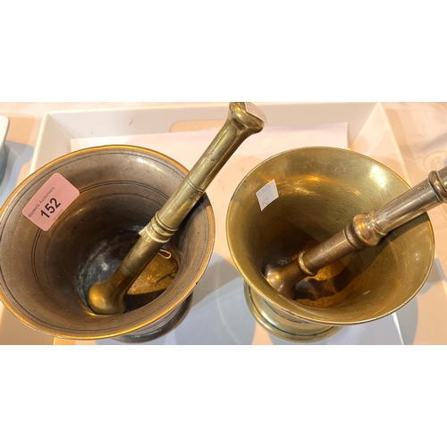 152 - Two antique bronze mortars with pestles