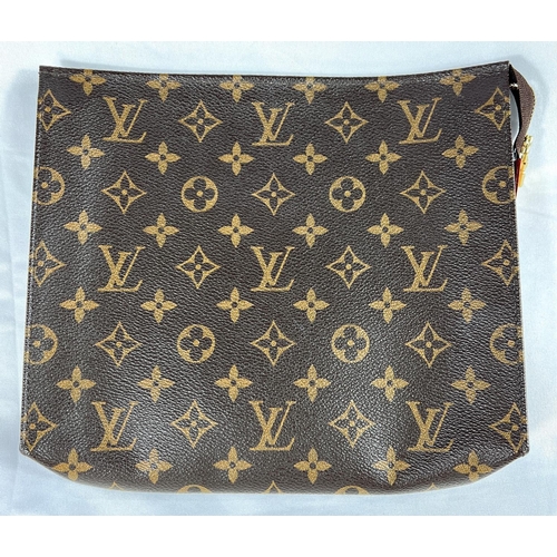 155 - A Louis Vuitton wash bag in original cloth protector bag with Louis Vuitton carrier bag and original... 