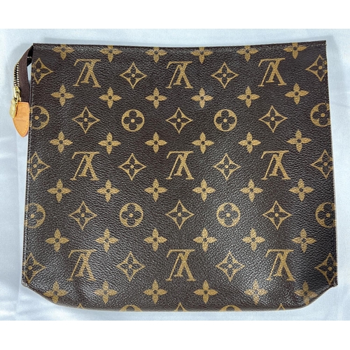 155 - A Louis Vuitton wash bag in original cloth protector bag with Louis Vuitton carrier bag and original... 