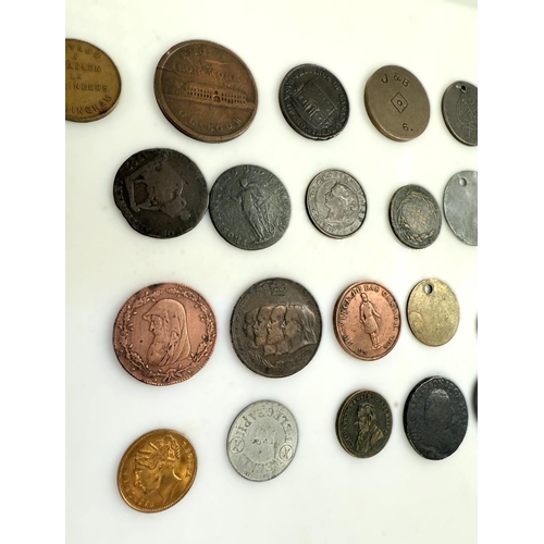 228 - A collection of 25 tokens, 18th-20th Century.