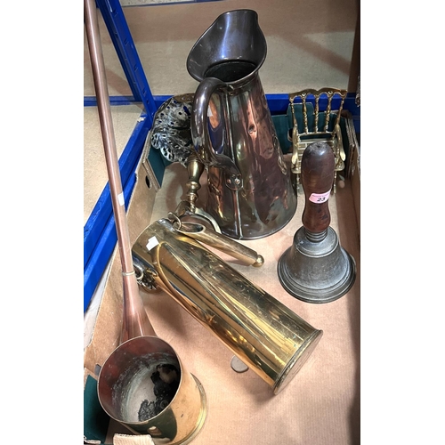 23 - A traditional hand bell, two trench art shells, brass kettle and trivet etc.