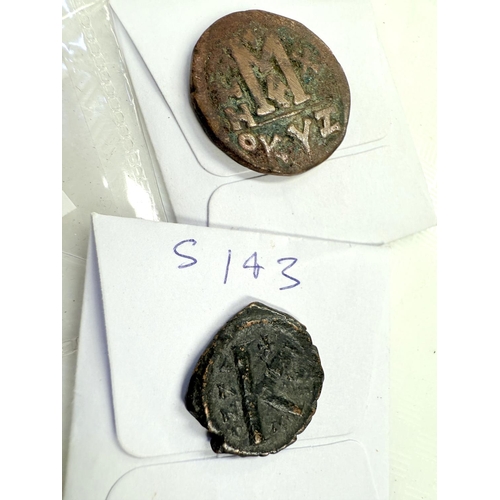 239 - ROMAN etc. - a selection of seven older coins and tokens.