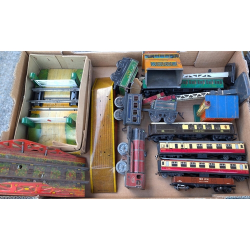 325 - An 'O' gauge tin plate clockwork loco track, carriages, buildings etc.