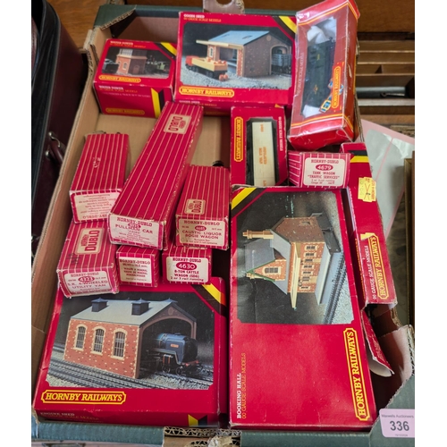 336 - A collection of Hornby 00-gauge boxed, Pullman cars, wagons, building, a diesel locomotive etc.