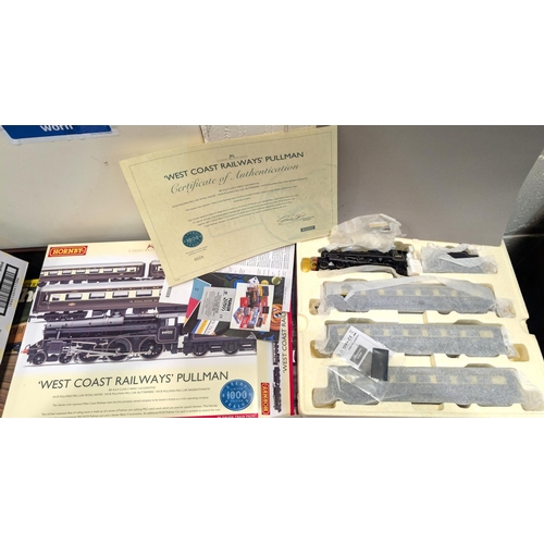 339 - Hornby '00' gauge R2979 West Coast Railways Pullman train pack with locomotive and carriages.