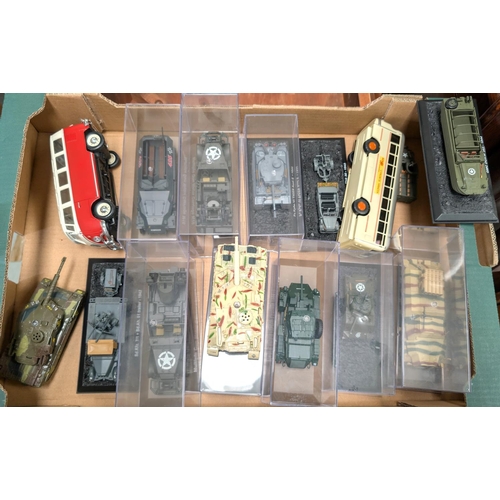 367 - A collection of military tanks, a VW camper Maisto, tin plate bus etc.