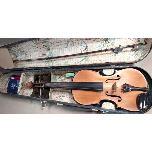 388 - A modern cased violin in good playable state with bow