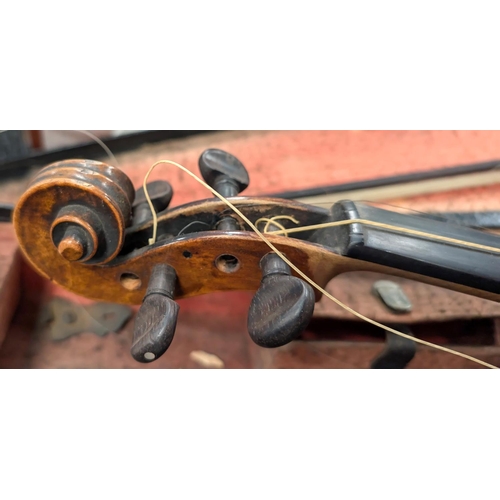 389 - A 19th century violin with case and bow back length 35cm