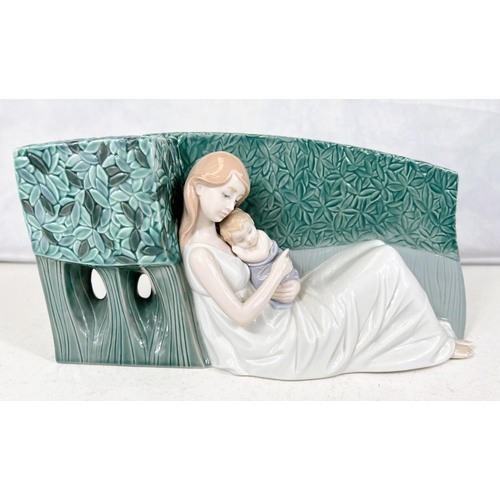 408 - A Lladro group: A Tender Caress, number 08436. Produced from 2009 to 2013, designed by Marco Antonio... 