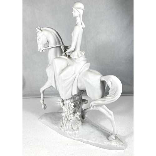 409 - A Lladro group: Woman on Horse, white, number 07061. Produced from 2007 to 2013, designed by Fulgenc... 