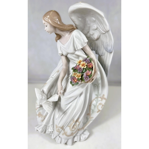 410 - A Lladro group: Flowers of Peace, number 01867. Produced from 2001 to 2004, designed by Virginia Gon... 