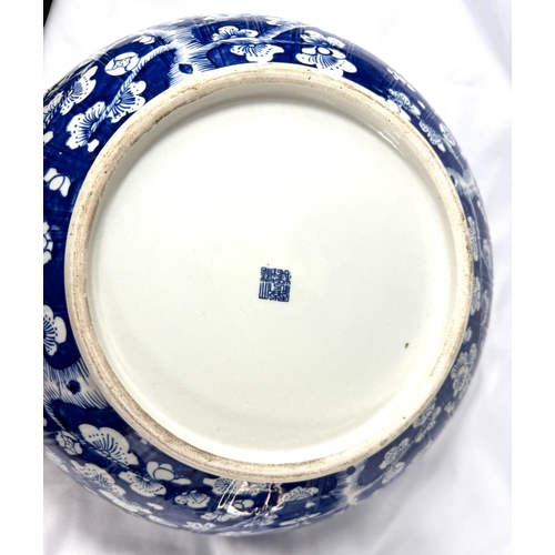 415A - A large Chinese blue and white bowl with floral decoration, ribbed, seal mark to base, diameter 40cm... 