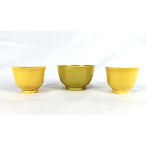 416 - Three Chinese yellow tea bowls two the same and one with 6 character to the base