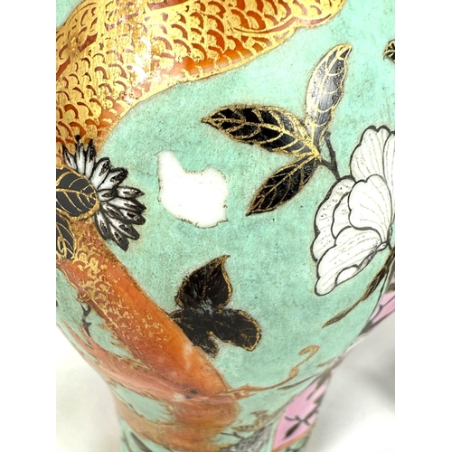 416B - A Chinese 'trio' vase with green, yellow and pink sides each with neck, dragons to the panels six ch... 