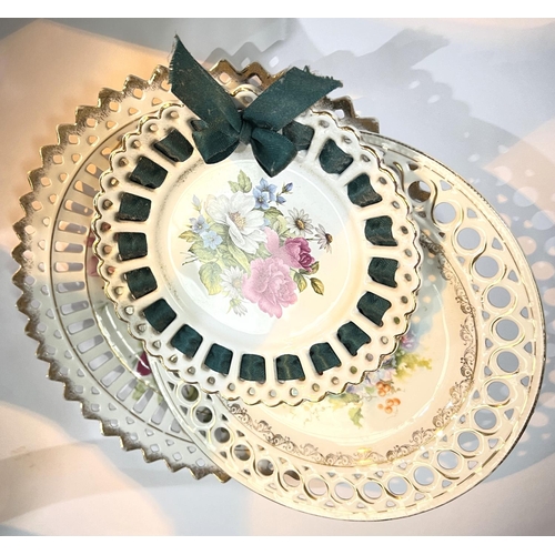 449 - A large selection of decorative ribbon plates.