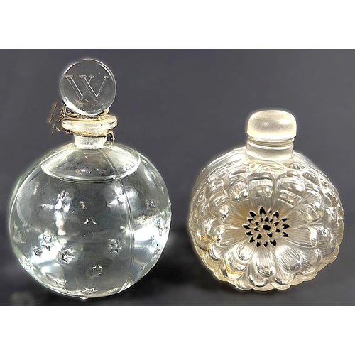 463 - LALIQUE: a bulbous perfume bottle with scattered embossed stars in the 'Flacon Dans La Nuit' design,... 