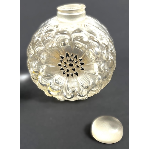 463 - LALIQUE: a bulbous perfume bottle with scattered embossed stars in the 'Flacon Dans La Nuit' design,... 