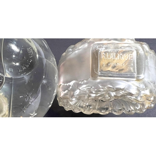 463 - LALIQUE: a bulbous perfume bottle with scattered embossed stars in the 'Flacon Dans La Nuit' design,... 