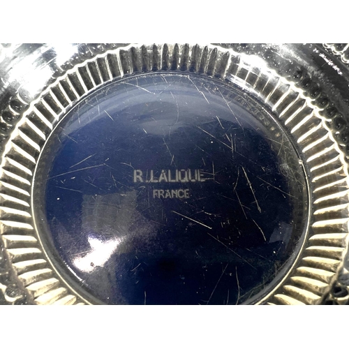 465 - R LALIQUE: a wide rimmed shallow bowl with pearlescent rim, a geometric pattern of 1cm 'rods' with r... 